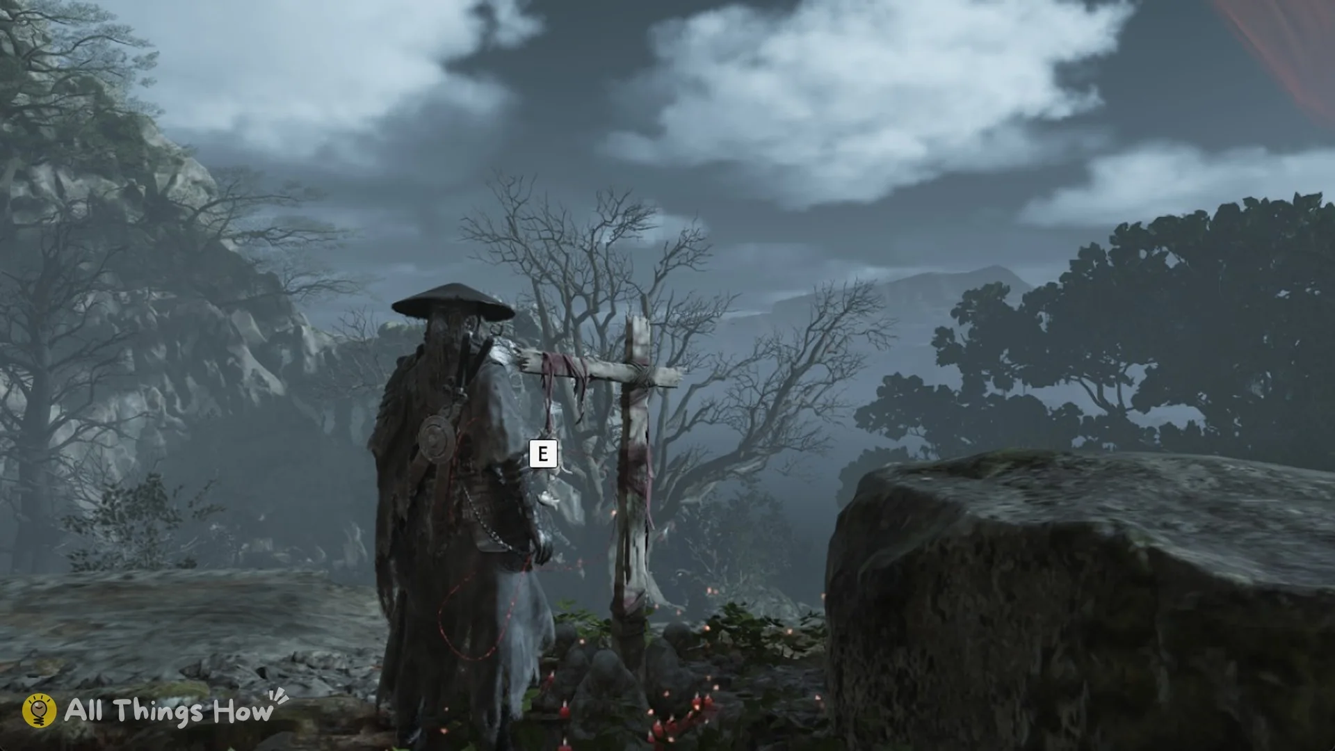 Soul beside the Parting Mists bell, a wooden cross under a bare tree next to a big rock, with the E prompt, Phantom Blade Zero
