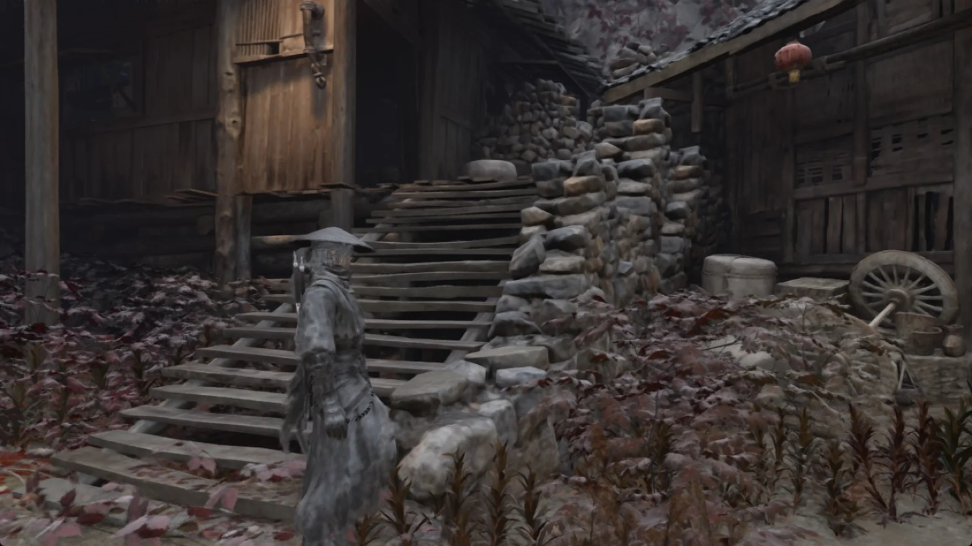 Soul by wooden stairs between old houses in Phantom Blade Zero