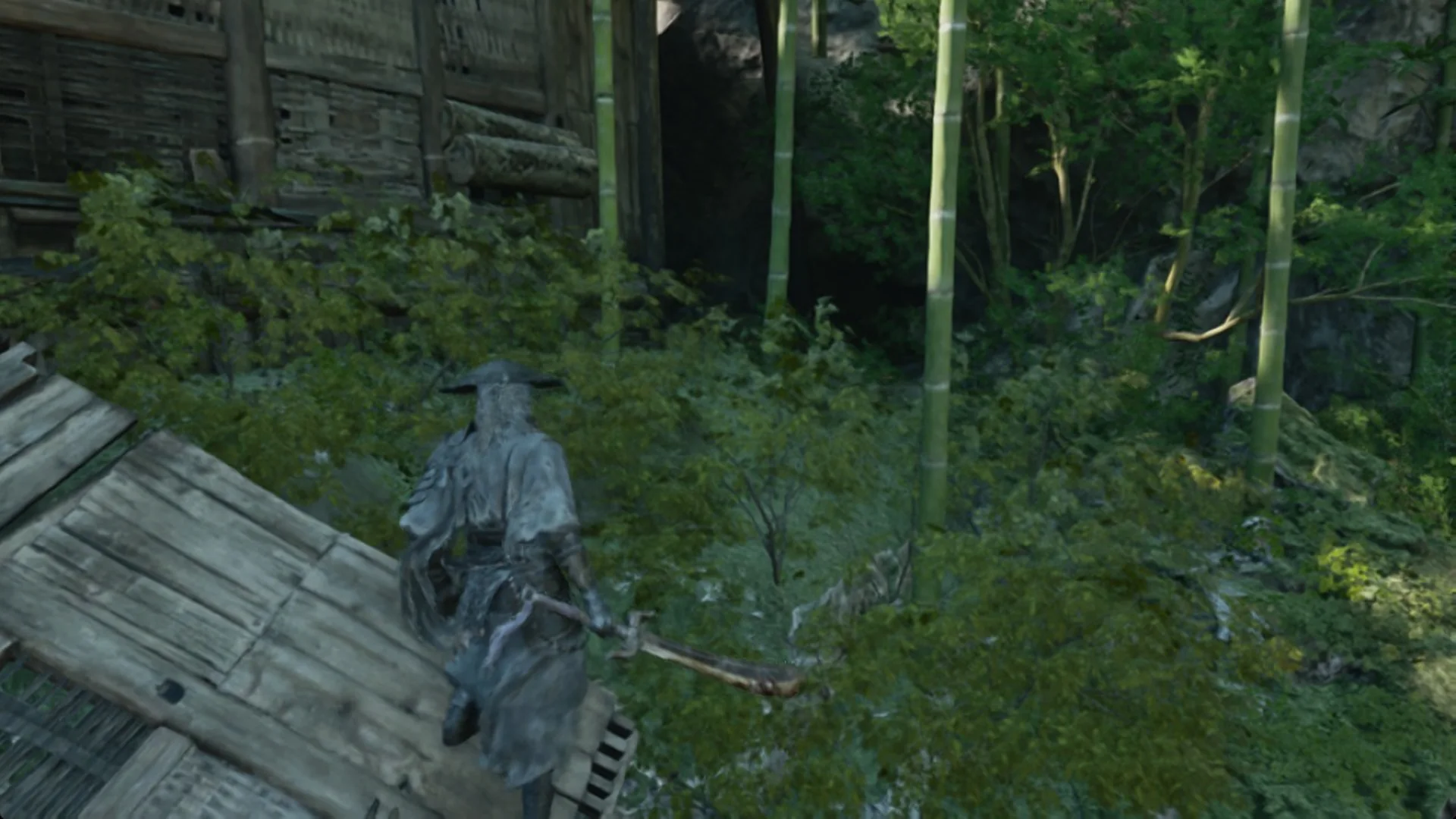 Soul on a wooden walkway beside bamboo and thick undergrowth in Phantom Blade Zero