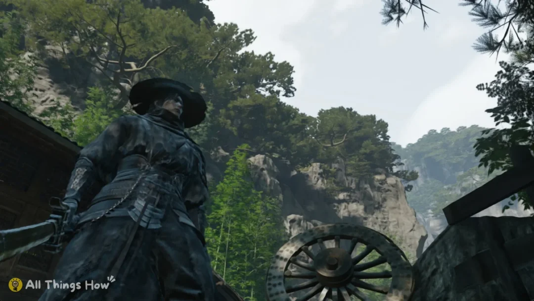 Soul looking up past a cart wheel at pine-covered cliffs in Phantom Blade Zero