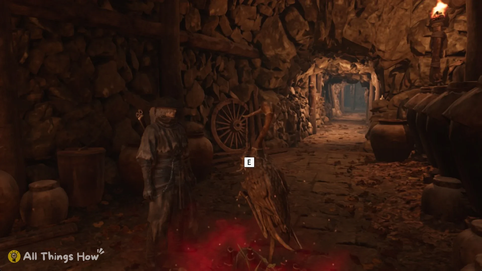 Soul at the mouth of a torch-lit stone tunnel, Phantom Blade Zero