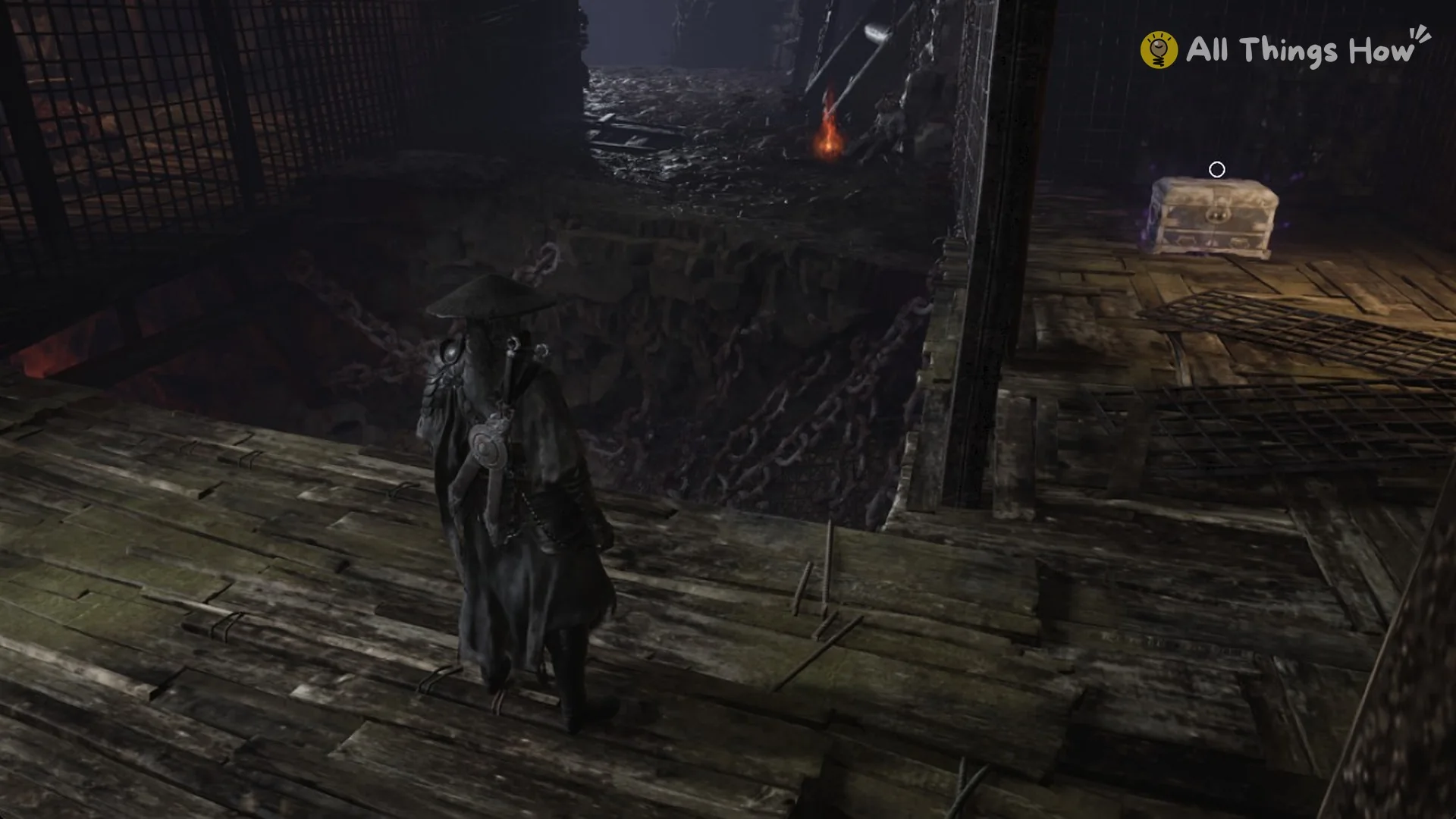 The chest behind the grille seen from the plank landing across the chain pit in the Crimson Forest cellar, Phantom Blade Zero