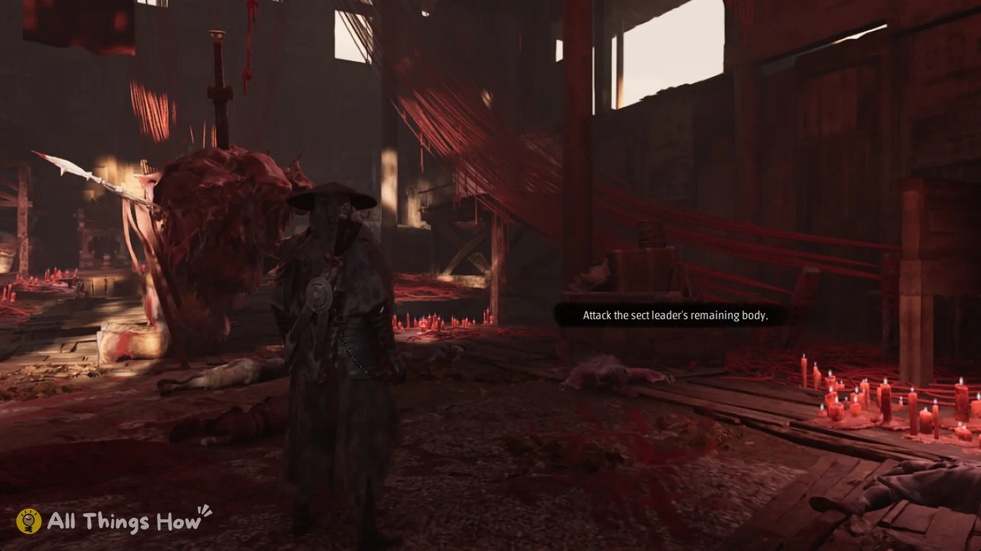 The hint Attack the sect leader's remaining body beside a fleshy mass pierced with blades, Phantom Blade Zero