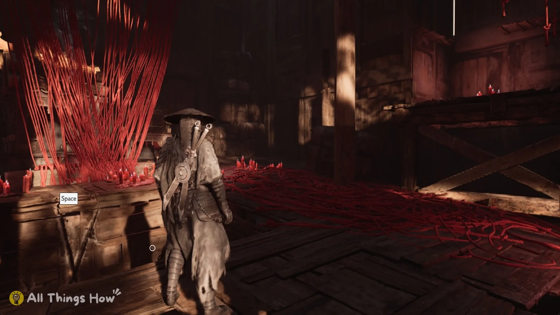 The Space prompt by the red-thread crate wall that slides you down below the hall, Phantom Blade Zero