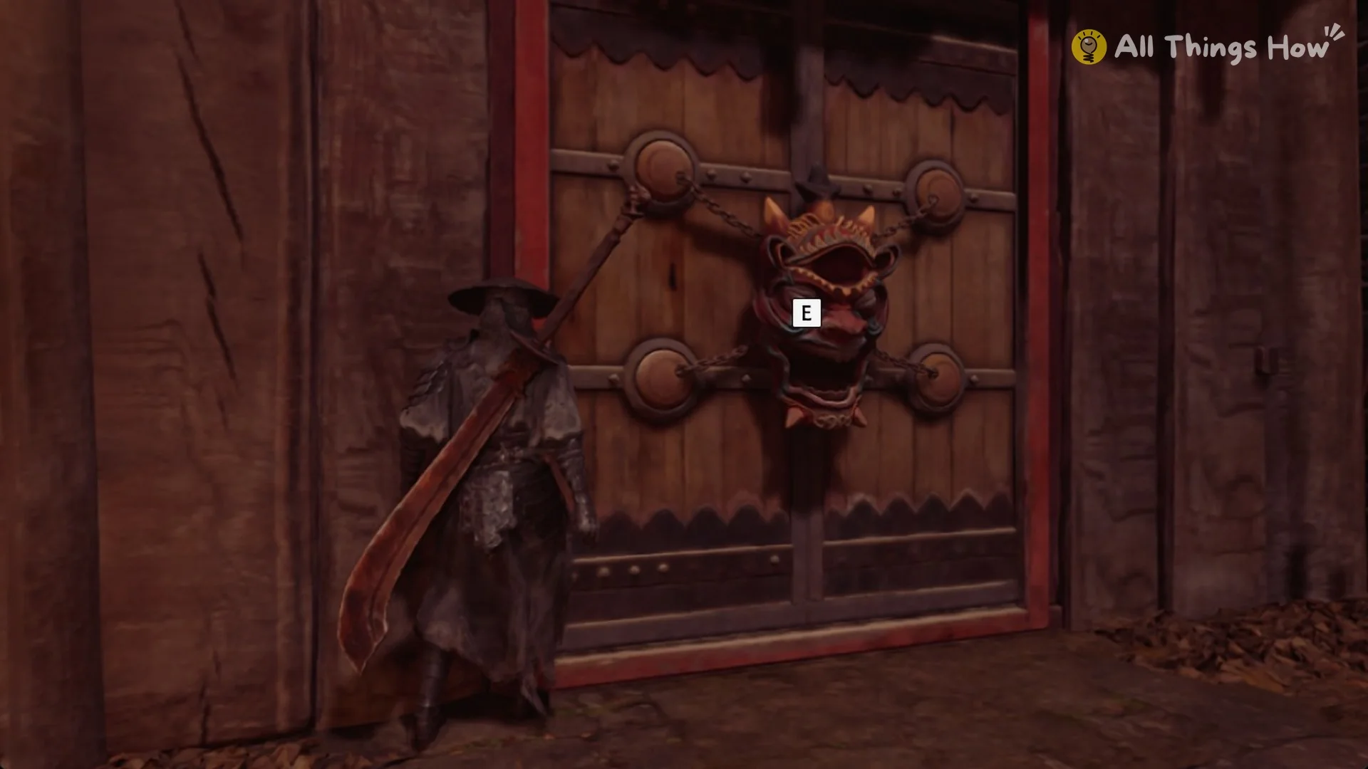 The red Smuggler's Tunnel gate with its horned puppet-mask knocker and the E prompt, Phantom Blade Zero