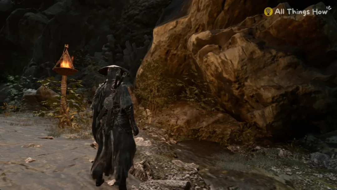 Soul beside the lantern where Solvent lies behind the Great Waterfall in Phantom Blade Zero