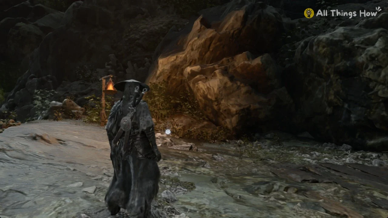 Solvent glint on the ground beside the lantern post in Phantom Blade Zero