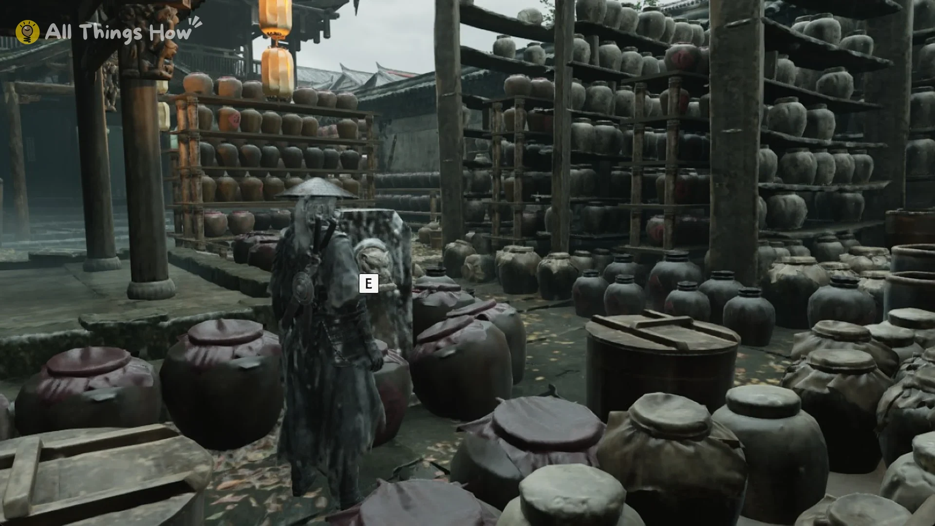 Soul beside the stone post with a lion-head ring by the pavilion steps in the wine-jar courtyard of the Order’s tavern, with the E prompt showing
