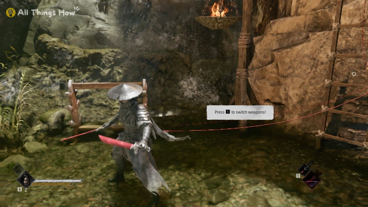 Armored warrior in conical hat holding two red blades in a rocky cave, with weapon switch prompt and health bar.