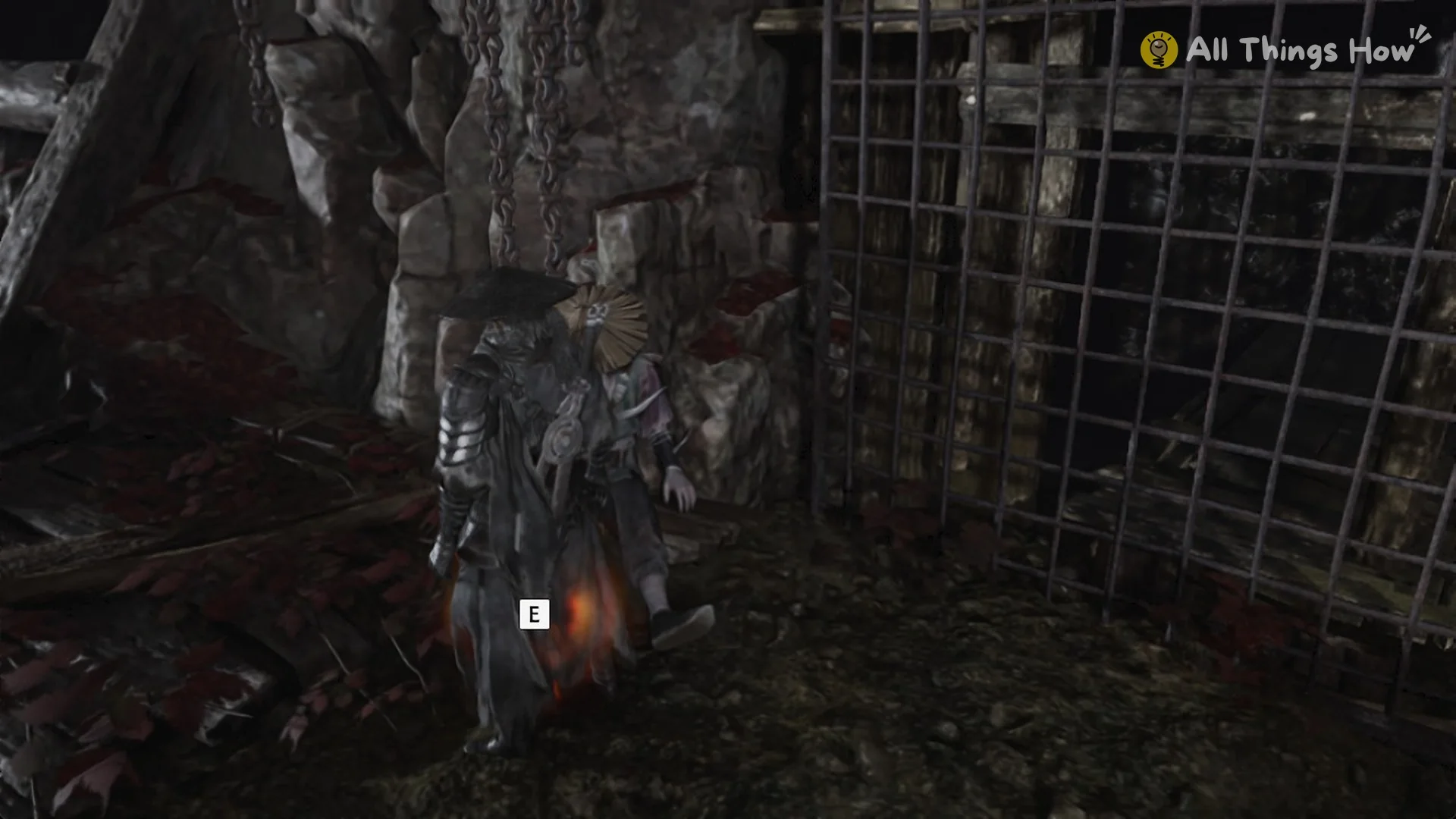 The E prompt at the body holding the Thieves' Camp Dungeon Key under hanging chains, Phantom Blade Zero
