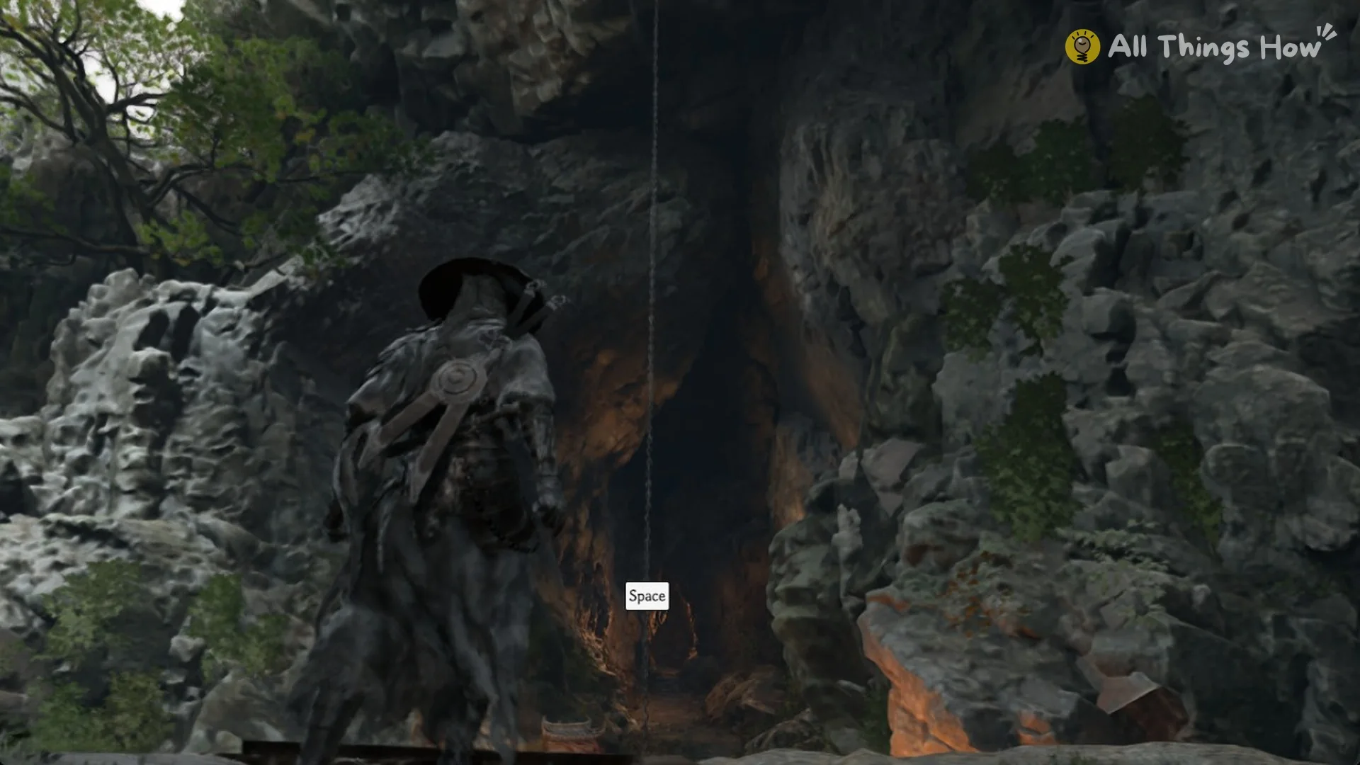 Space prompt on the hanging chain in the cave mouth in Phantom Blade Zero