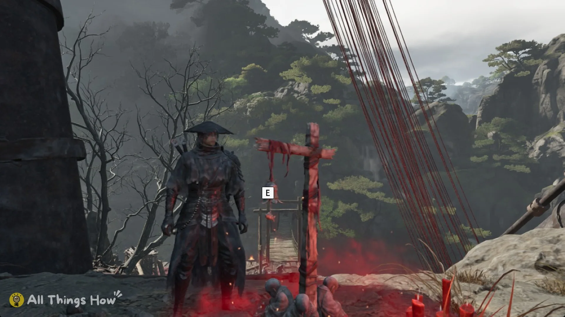 The red-cloth wooden cross of the Waterfall Bridge bell with its E prompt in Phantom Blade Zero