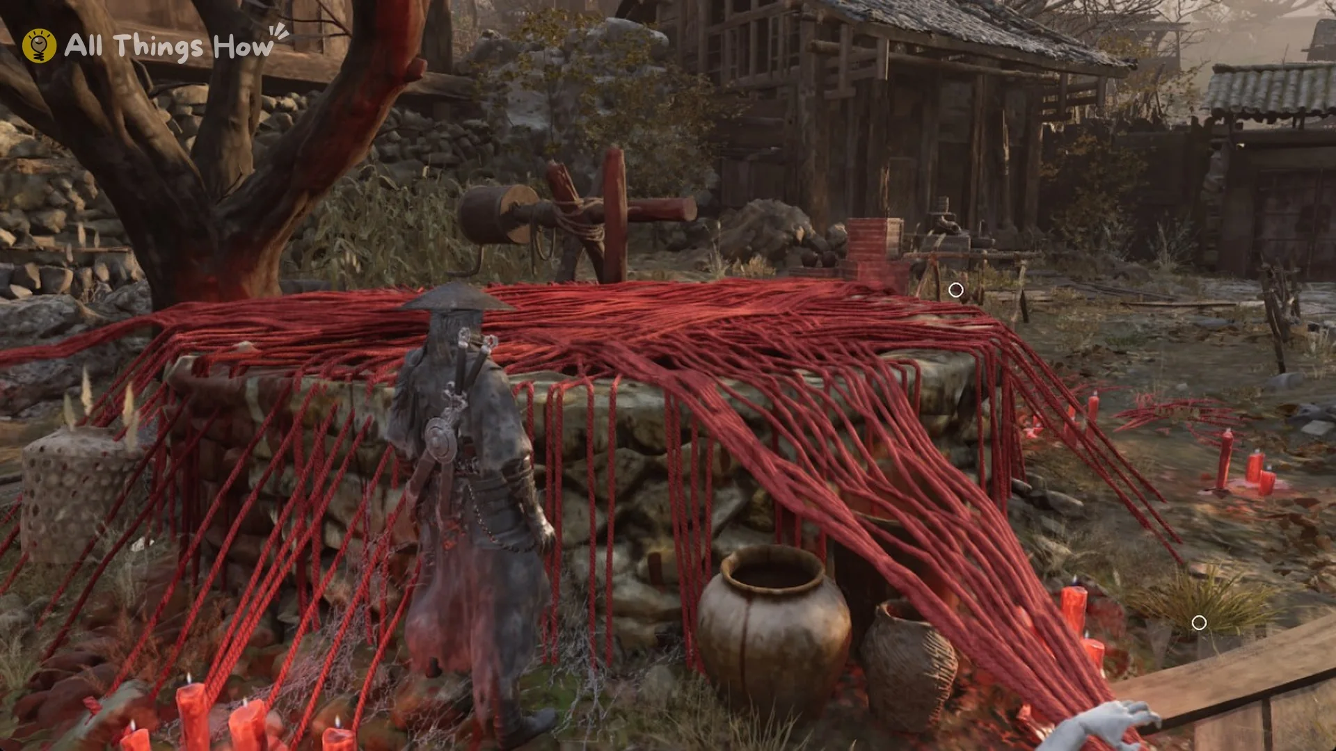 The well wrapped in red threads near the Well of the Three Puppets bell, Phantom Blade Zero