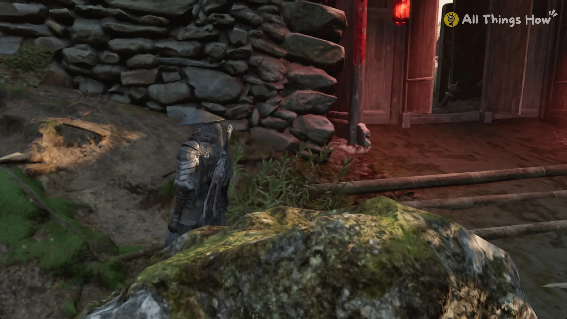 The red-lantern gate standing open on its village side, Phantom Blade Zero