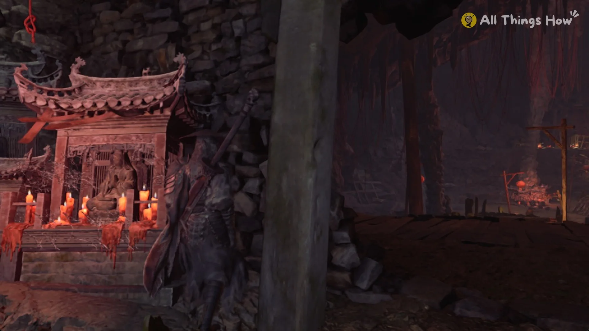 A candle-lit shrine on the cave path past the Beneath the Well bell, Phantom Blade Zero
