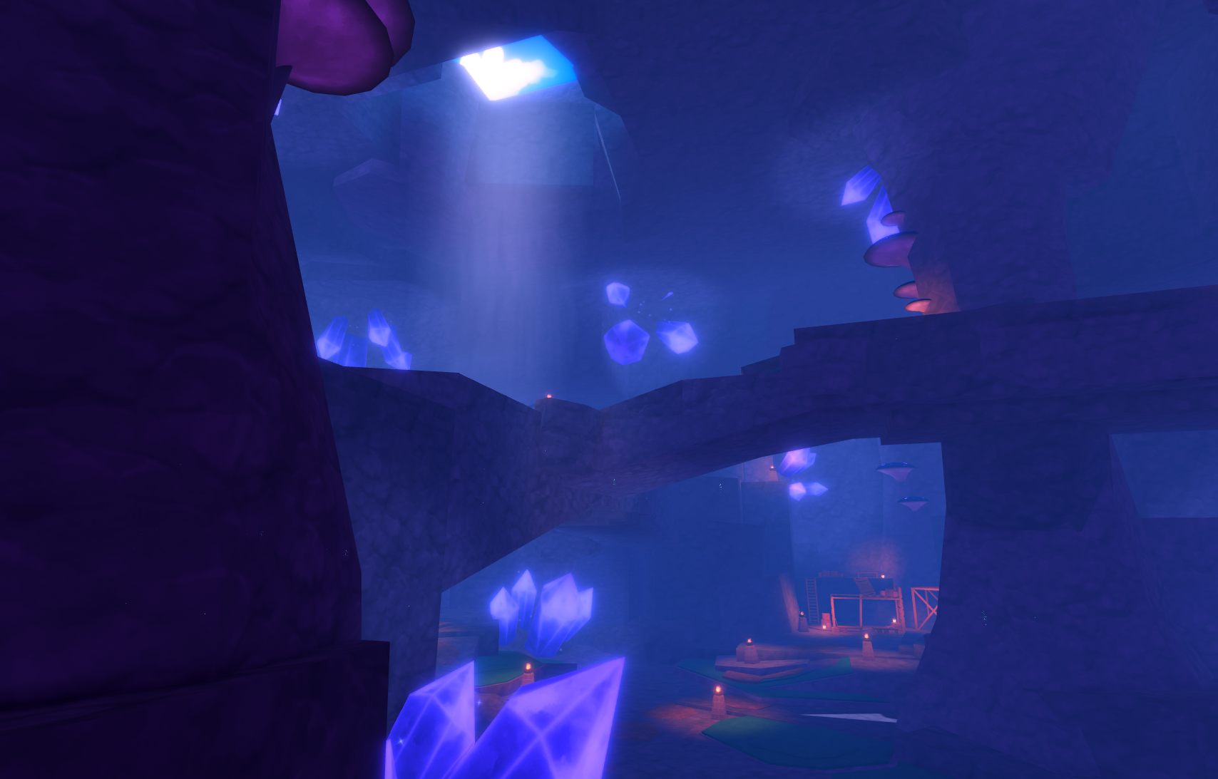 A blue-lit underground cavern is filled with glowing violet crystals and rocky ledges