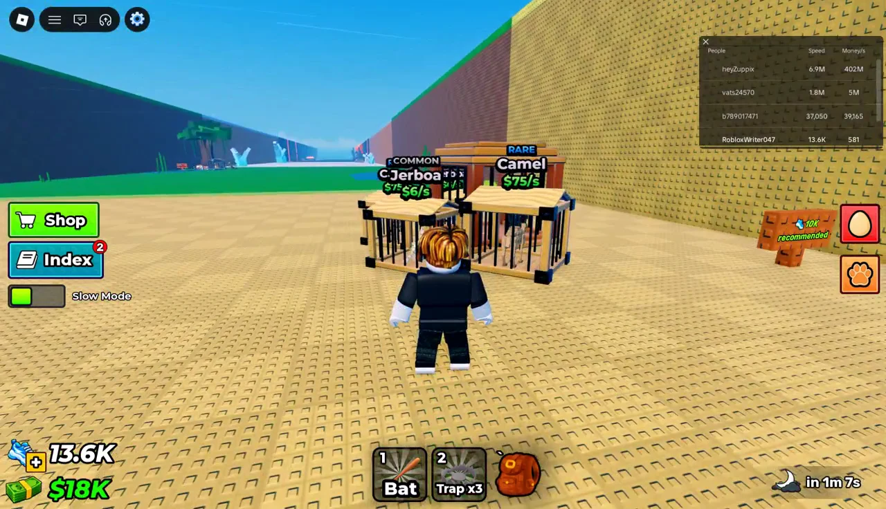 Two caged pets in the arena with their rarity and earnings rates shown above them
