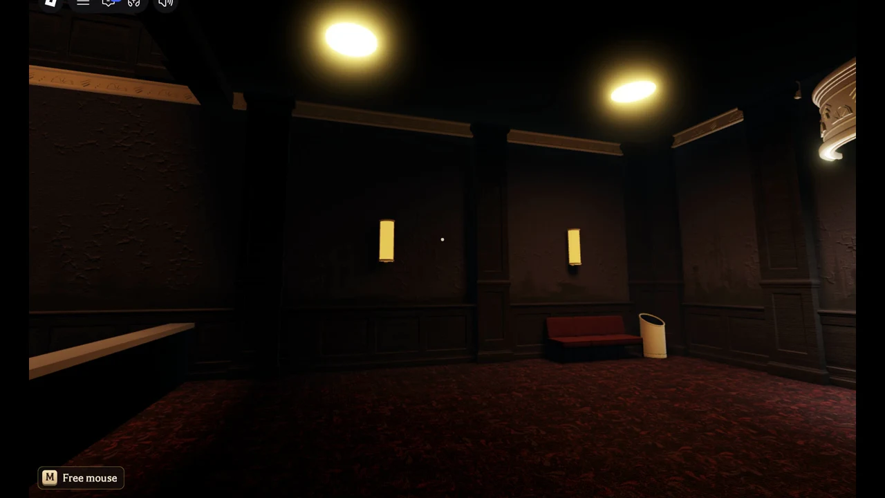 Wide, dim Floor 5 hall with wall lamps and the M Free mouse prompt in the corner