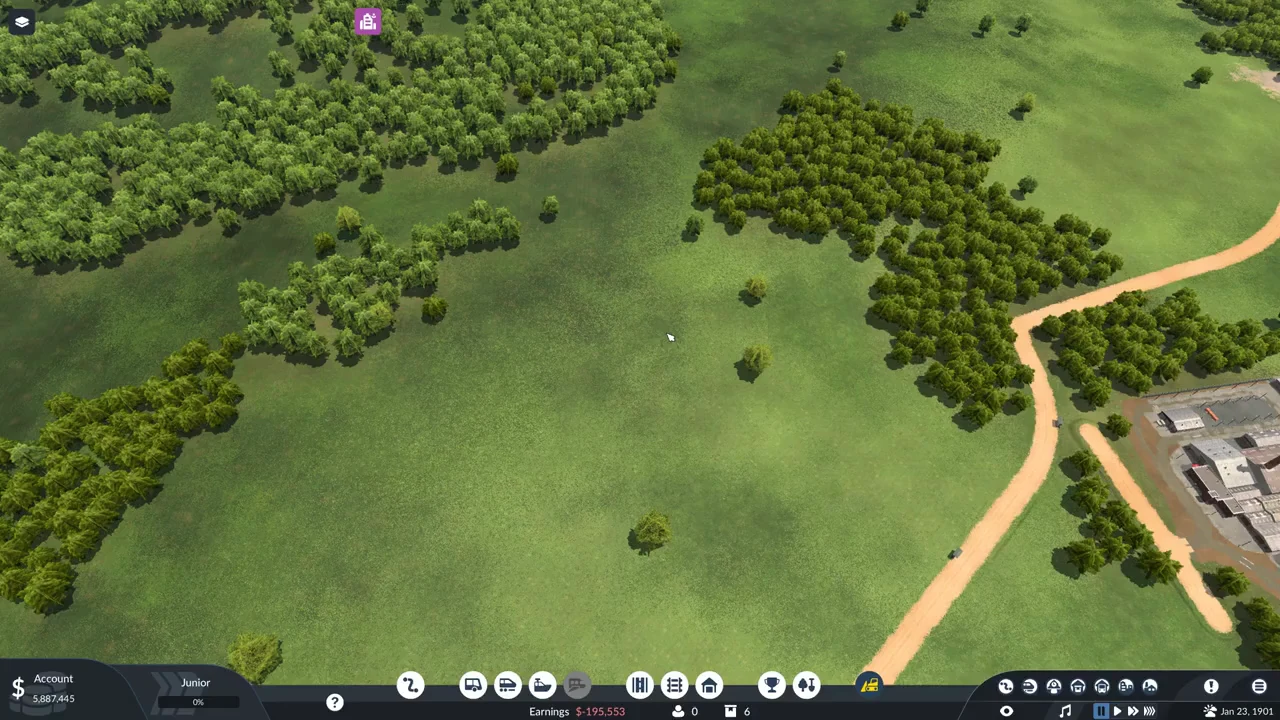 Empty meadow beside a dirt road with an account balance of $5,887,445 shown before any building is placed
