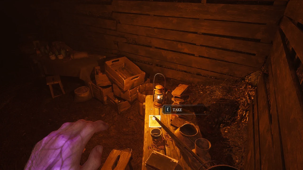 E TAKE prompt over a note on a lantern-lit table inside a Wolfsbane Field hut
