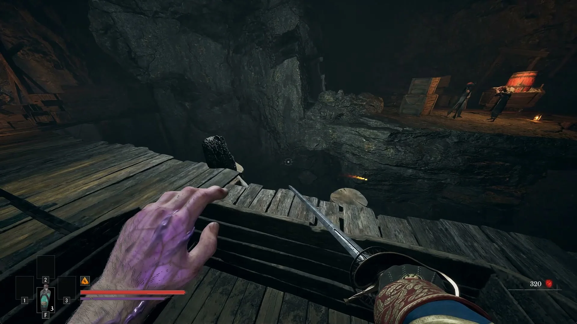 A mine cart rolling over a timber trestle in a dark cavern