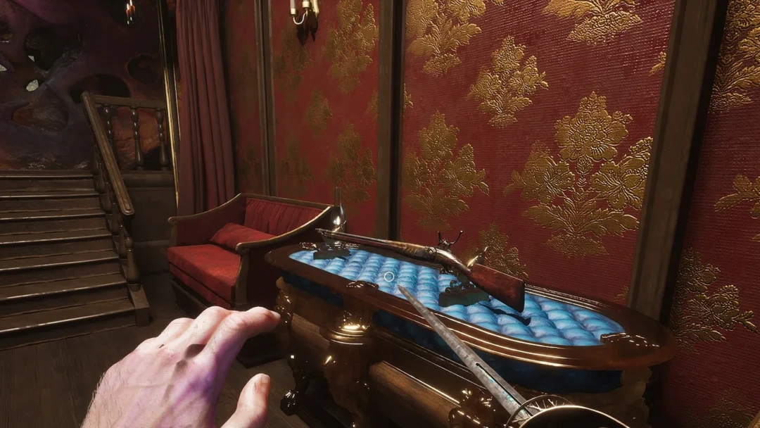 The Musket on its blue display case beside the staircase in the red-wallpapered room