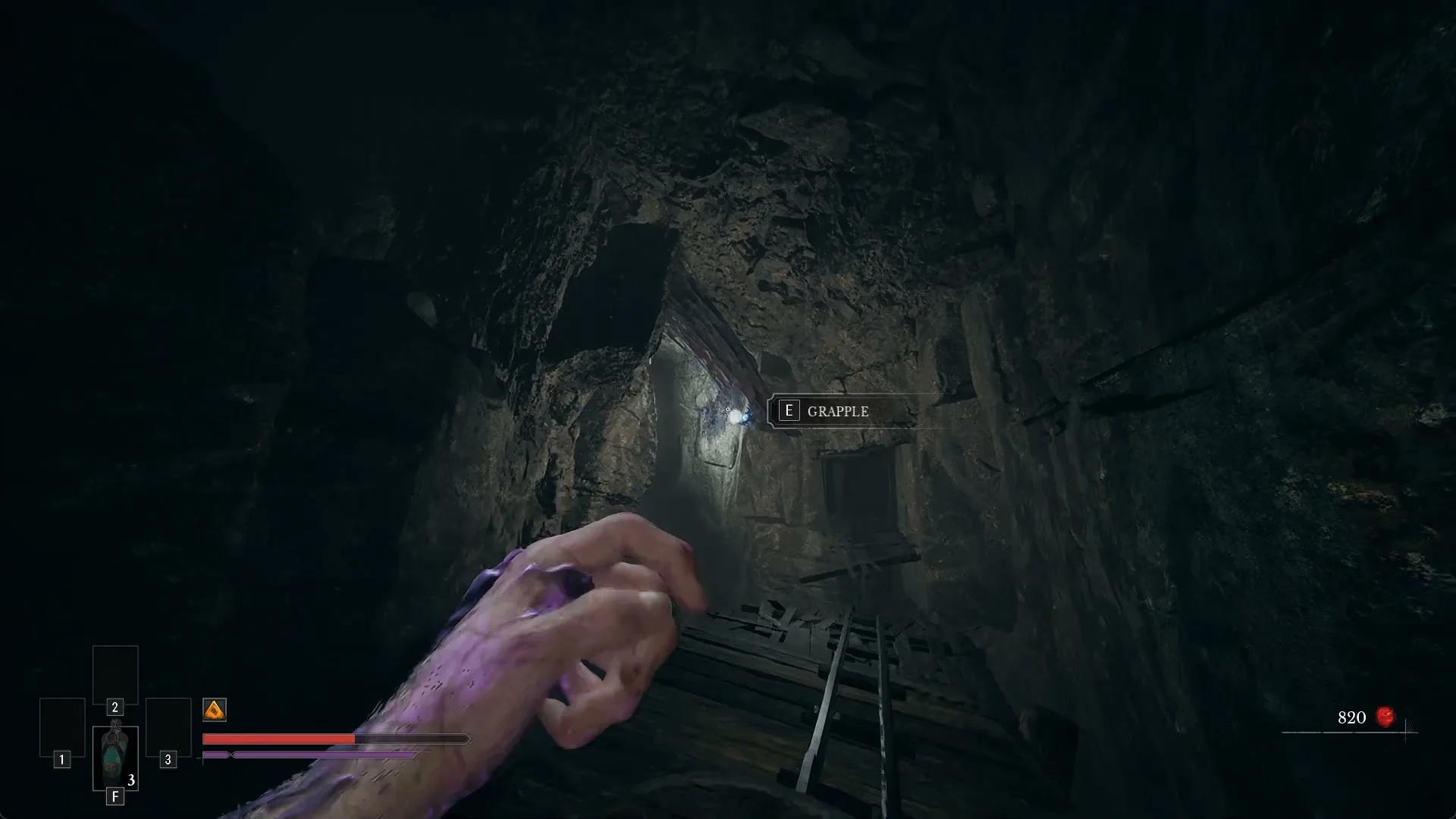 E GRAPPLE prompt on a glowing blue grapple point on the rock wall during the minecart ride