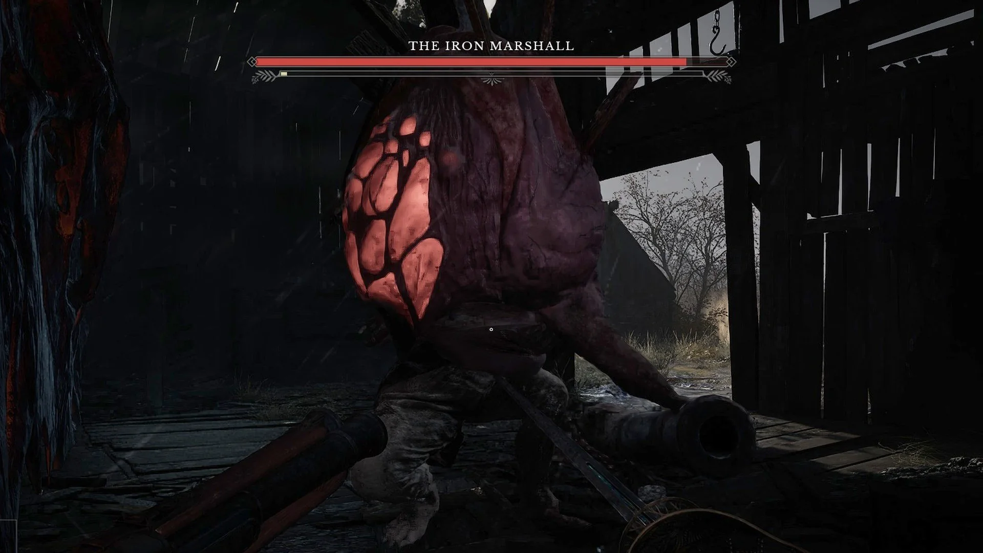 The Iron Marshall's back with a patch of glowing red growths, inside the barn