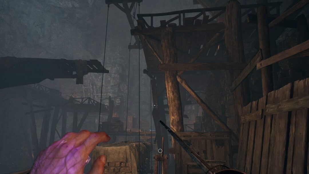 The crane and the cloth-covered hanging crate over the mine shaft past the Old Mine Lantern