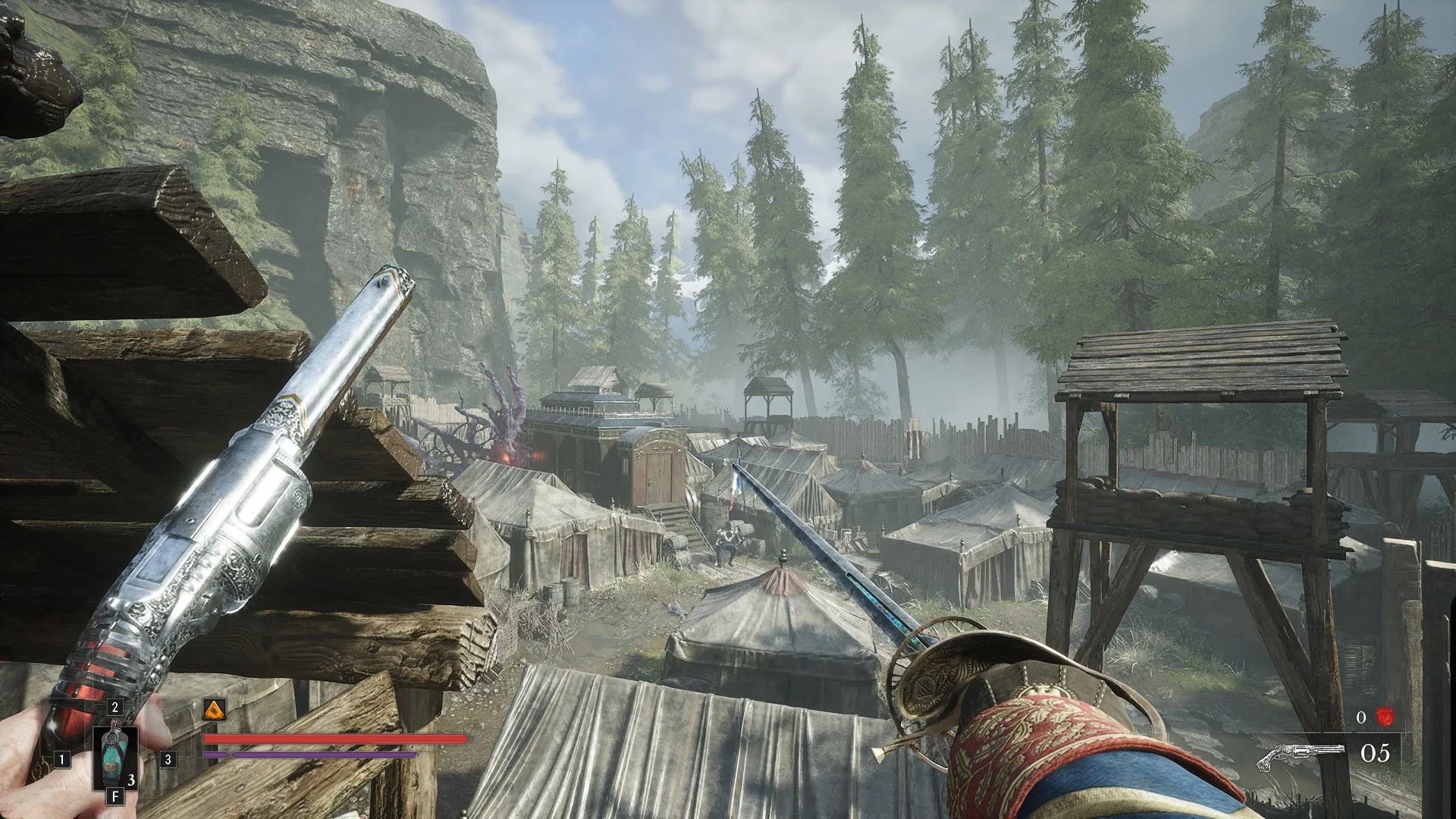 View over the Poisoned Camp tents, watchtower and road from a ledge on its east side
