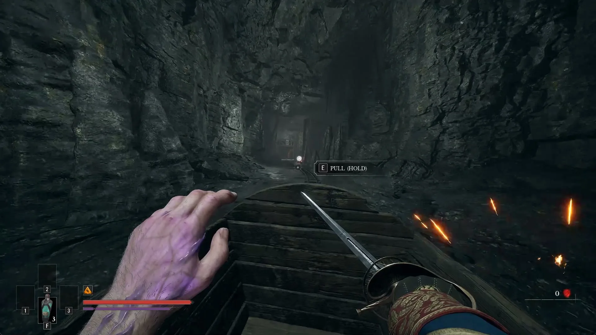 The view from the mine cart with the E PULL HOLD prompt on a lever ahead on the right