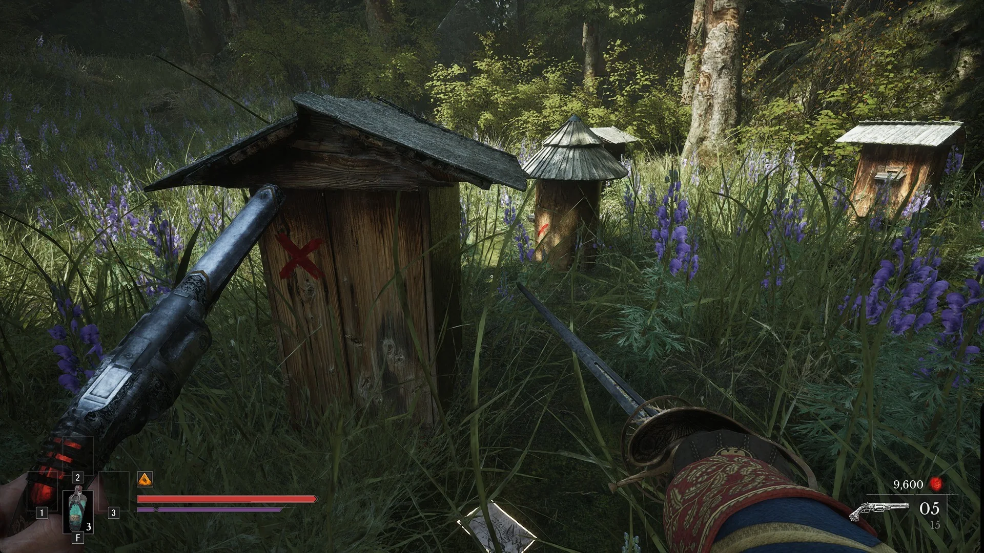 A beehive box with a red painted X on its side