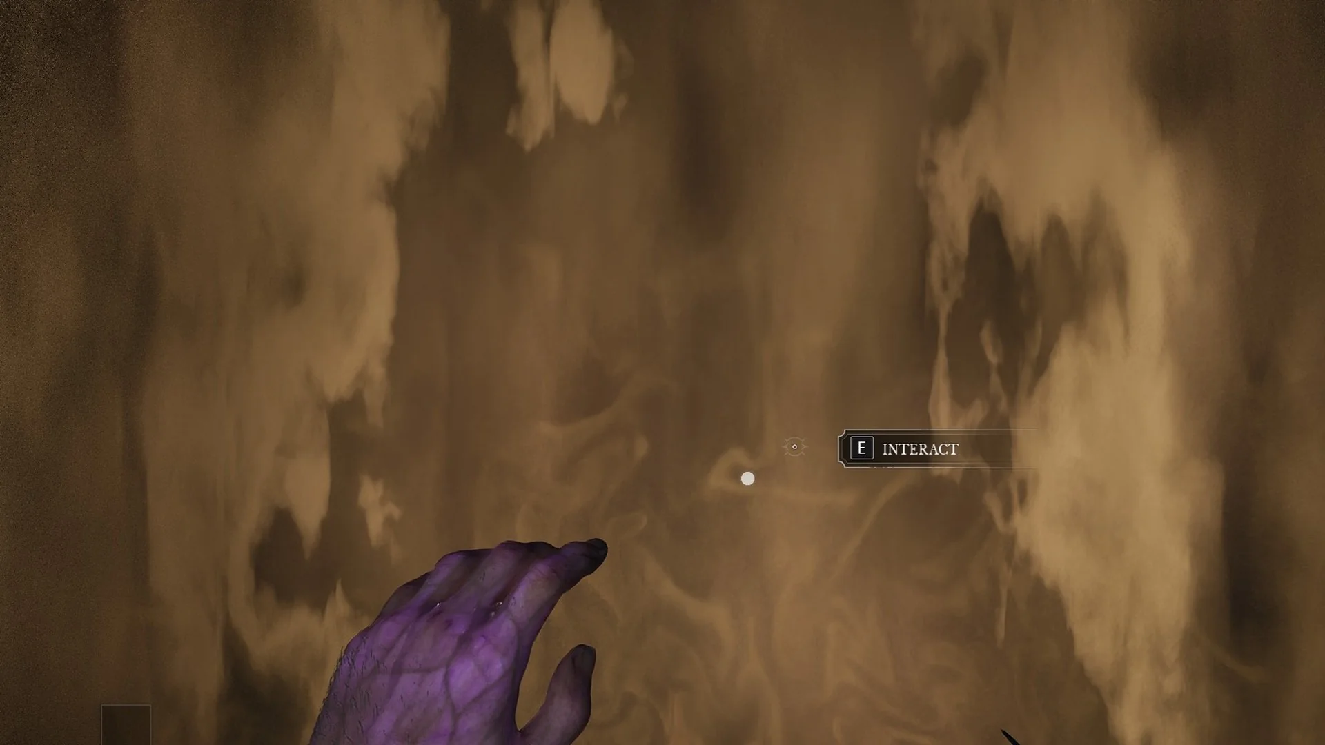 A wall of swirling golden sand with the E INTERACT prompt