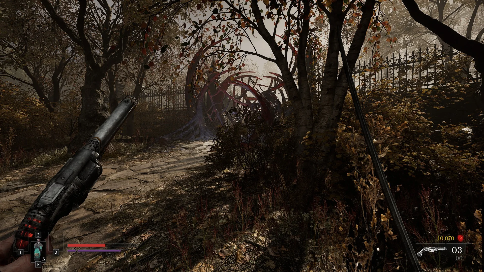 A cage of dark-red plague tendrils at the end of a cobbled churchyard path at the Abandoned Church in Valor Mortis