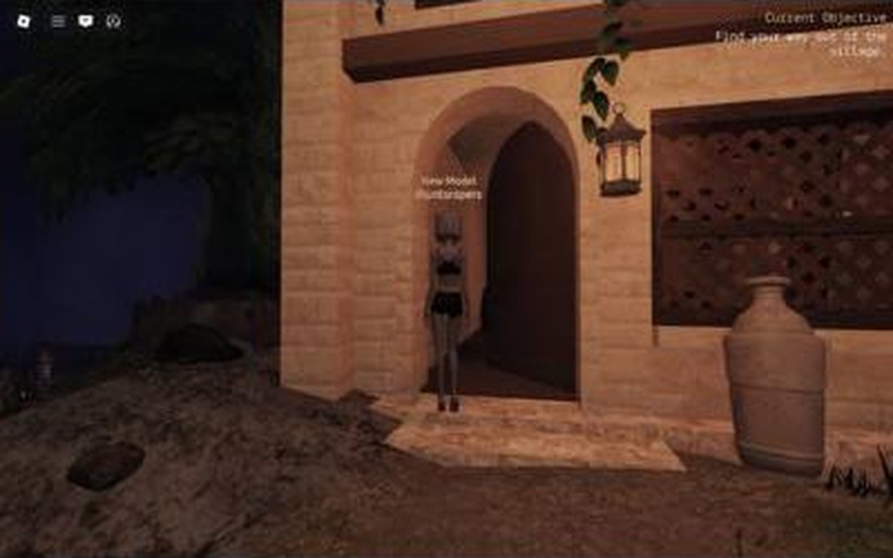 Character at the open arched doorway of the stone house, about to step inside