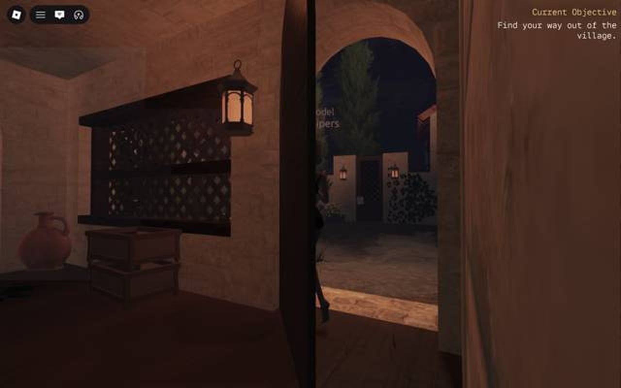 View from inside the key house through the open doorway toward the street and note gate