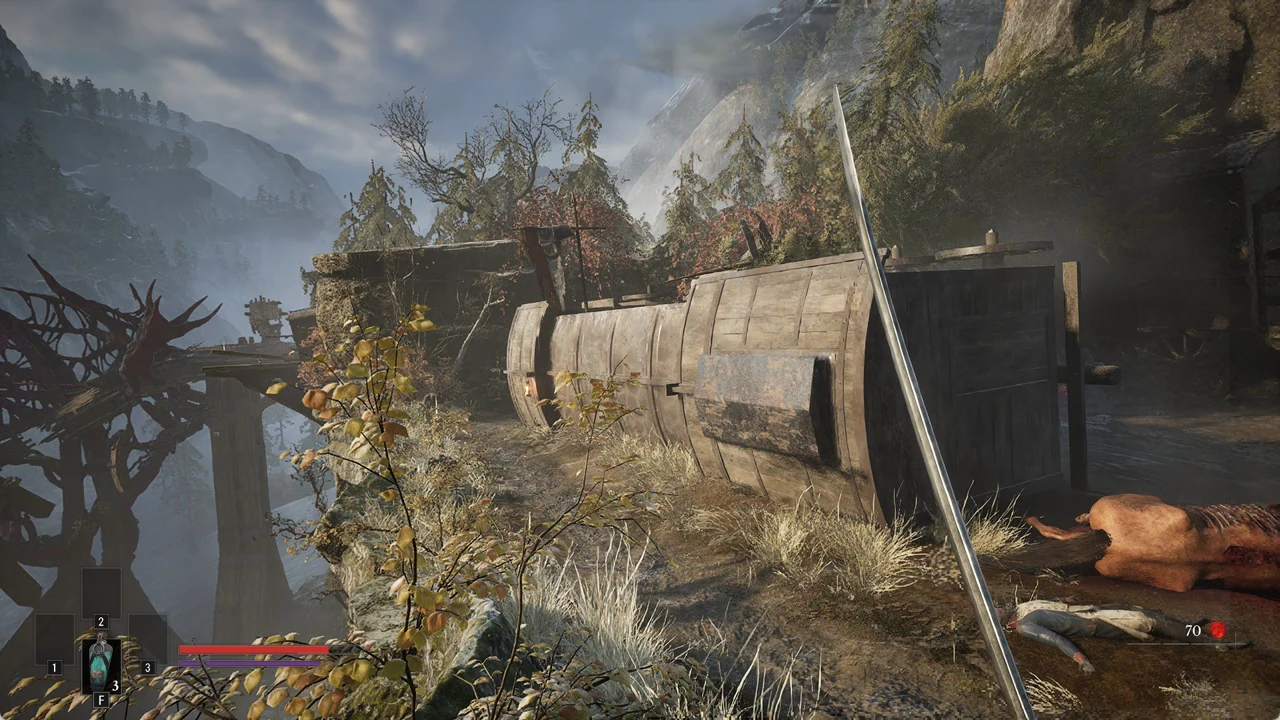 First-person view walking a cliffside path with sword drawn toward the overturned wooden carriage