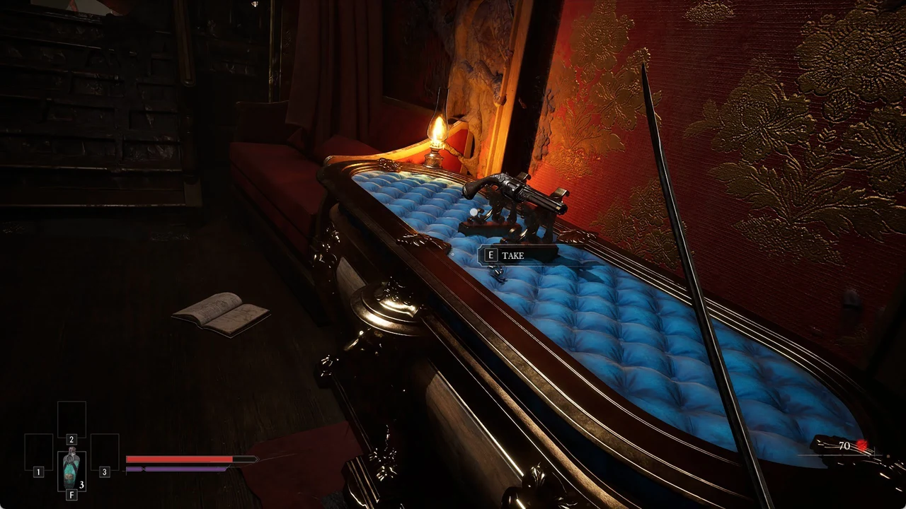 The E TAKE prompt over the pistol resting on the blue tufted display seat inside the carriage