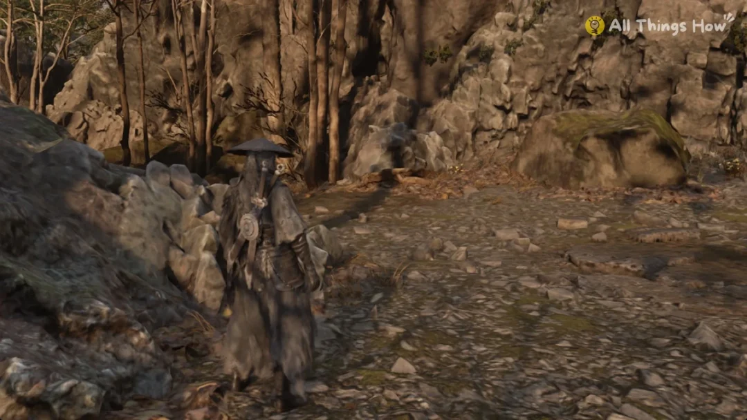 Soul walking a rocky woodland path in Phantom Blade Zero