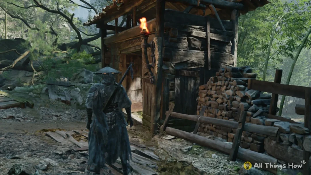 Soul standing by a timber hut and stacked logs at the Outpost camp in the bamboo forest of Weeping Creek Valley, Phantom Blade Zero